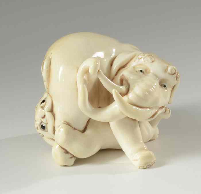 Appraisal: CHINESE HAND CARVED IVORY figure depicting an unusual stylized elephant