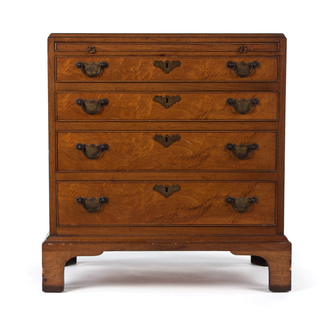 Appraisal: Beacon Hill mahogany bachelor's chest brushing slide and four graduated