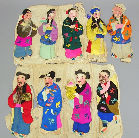 Appraisal: Lot of Chinese paper dolls Padded silk clothing with paper