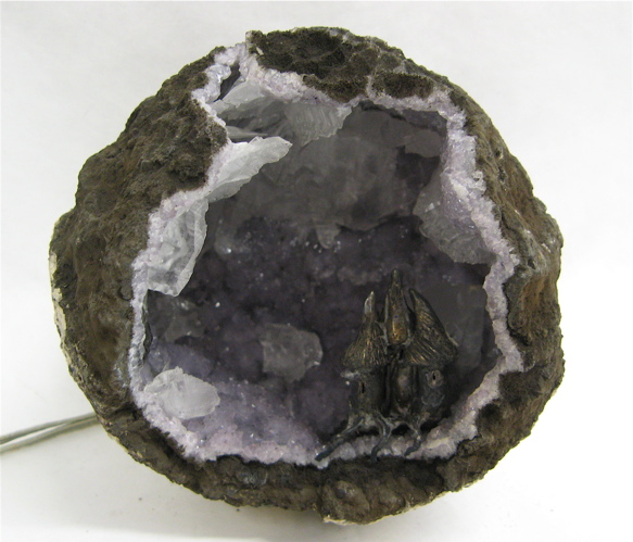 Appraisal: TWO STONE FORMATIONS an amethyst geode shades of purple to