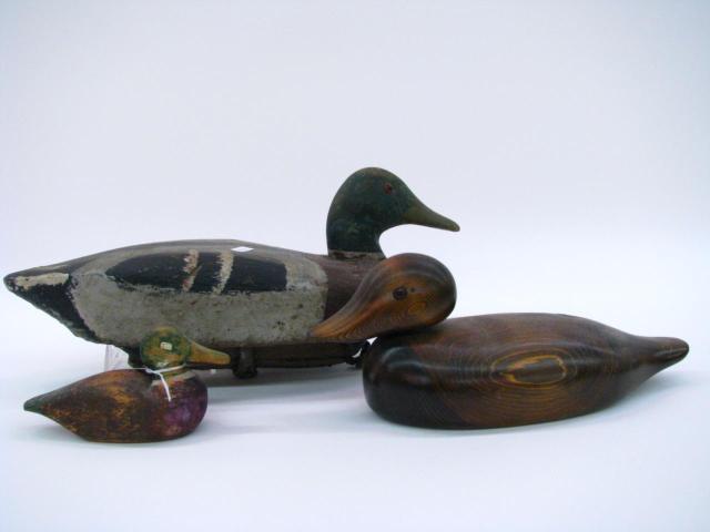 Appraisal: Three Wooden Carved Duck Decoys including '' with stringer rudder