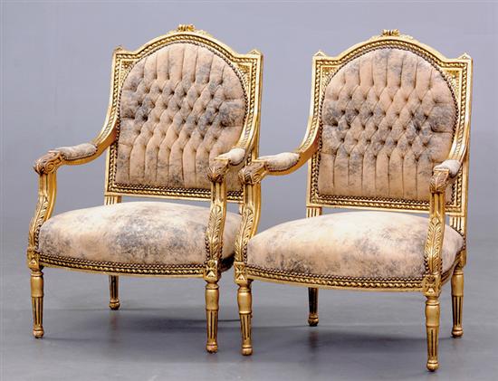 Appraisal: Pair Louis XVI style giltwood bergeres arched rectangular padded back