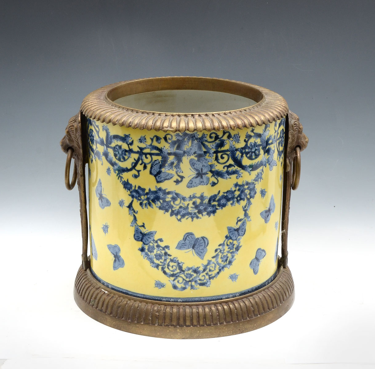 Appraisal: YELLOW BRONZE MOUNTED CHINOISERIE FERNER Yellow ground Chinoiserie porcelain ferner