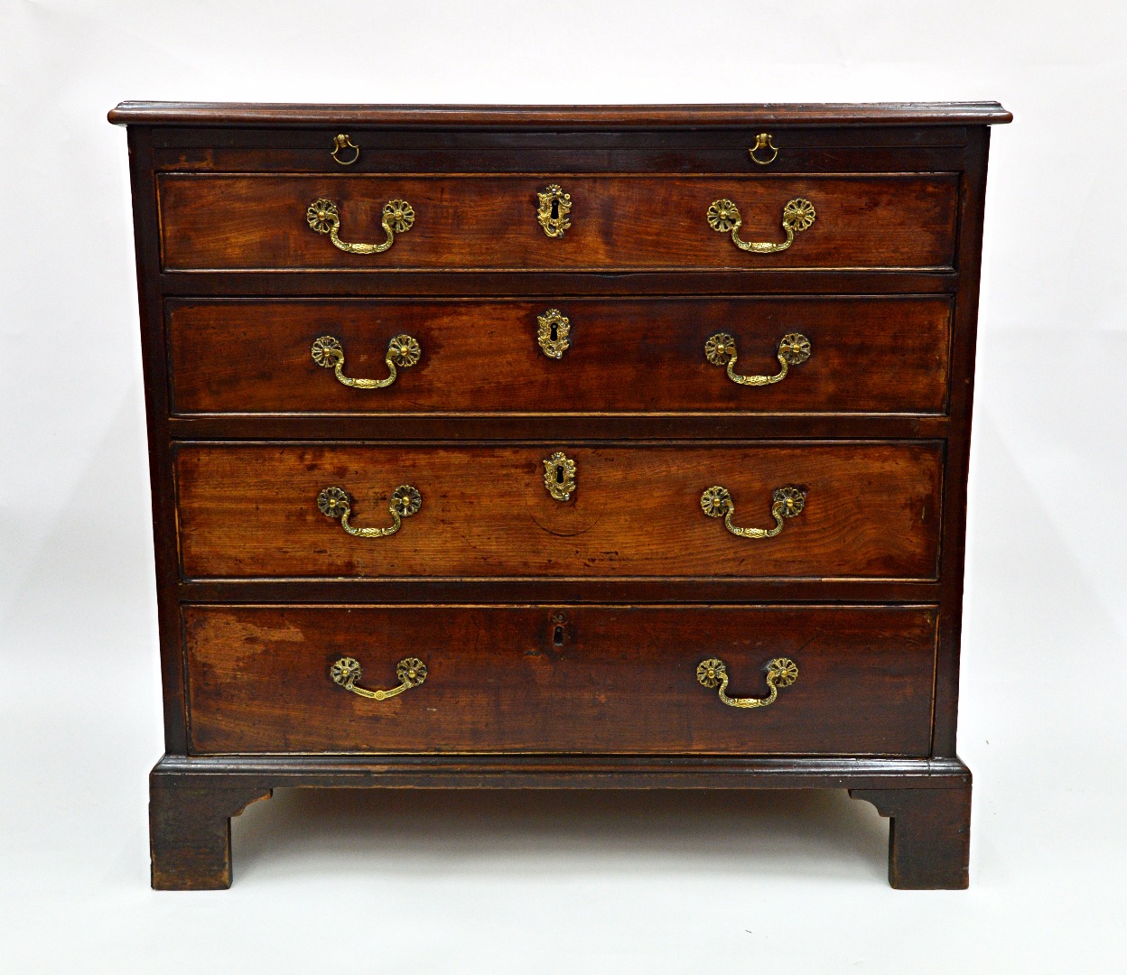 Appraisal: A George III mahogany chest the moulded rectangular top above