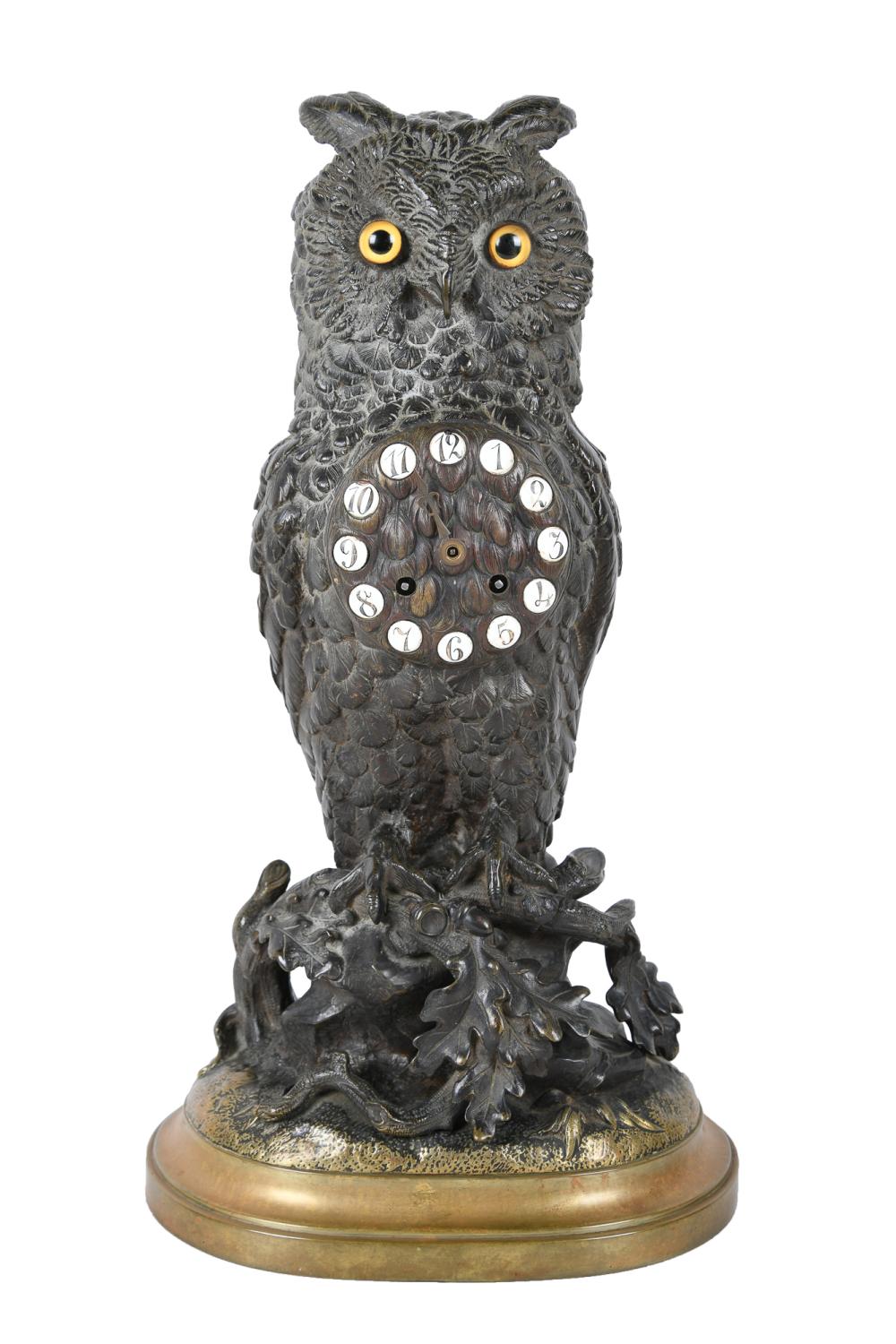 Appraisal: FRENCH BRONZE GILT BRONZE OWL CLOCKCondition missing one hand Losses