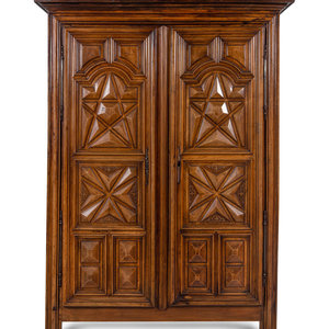 Appraisal: A Louis XIII Style Carved Walnut Armoire th Century and