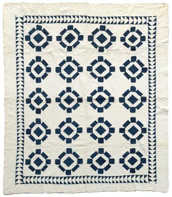 Appraisal: Finely stitched quilt blue and white medallions on a white