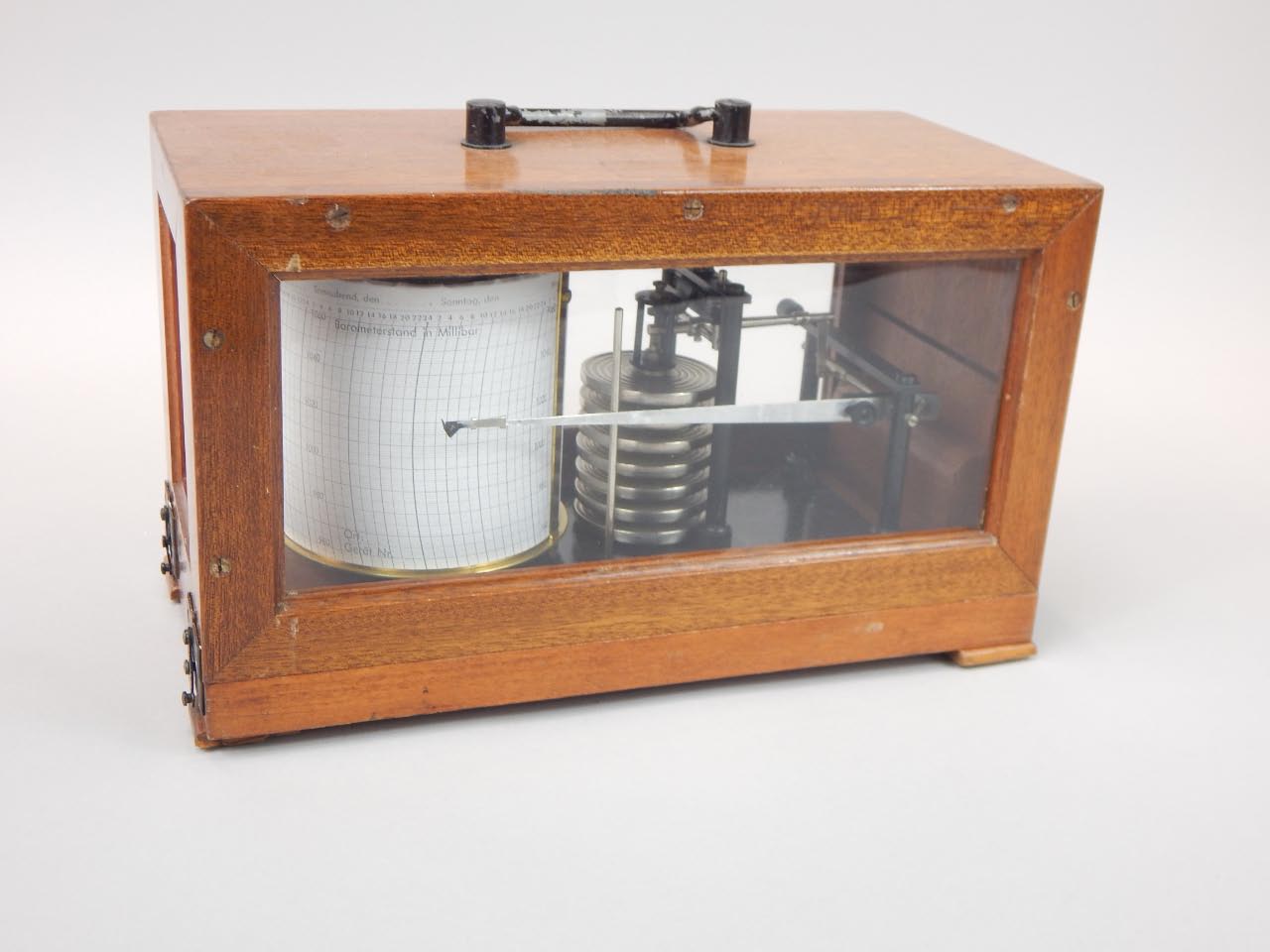 Appraisal: An early thC mahogany cased barograph with glazed sides unmarked