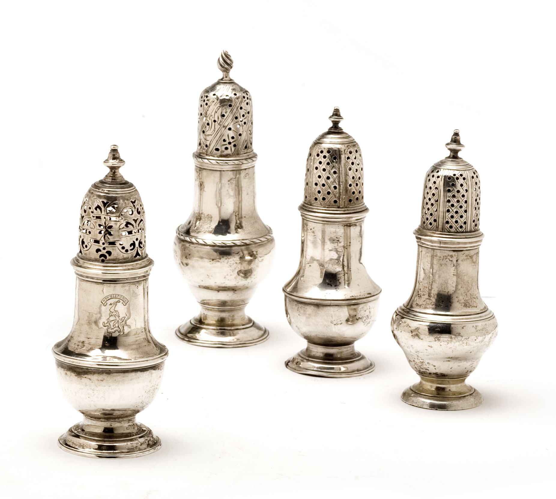 Appraisal: FOUR GEORGE II III SILVER VASE-FORM CASTERS SAMUEL WOOD -