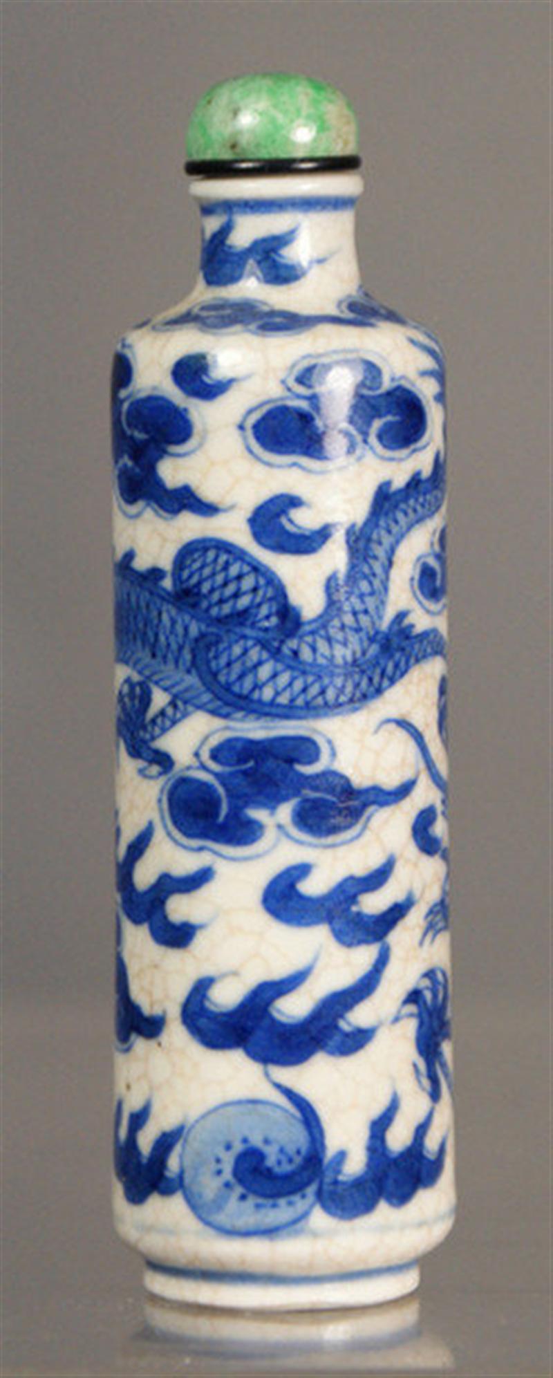 Appraisal: Soft paste porcelain snuff bottle blue underglaze dragon seeking flaming