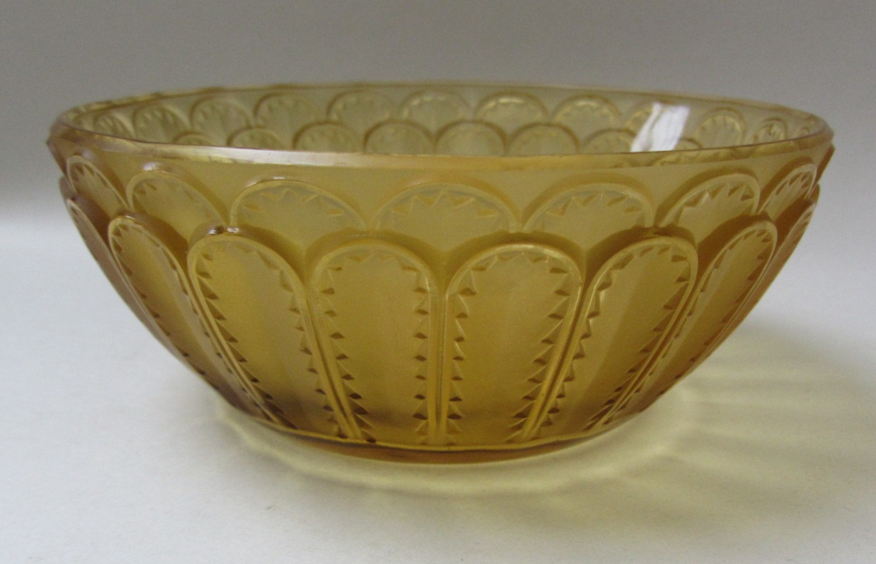 Appraisal: A Lalique 'Jaffa' bowl amber glass moulded with bands of