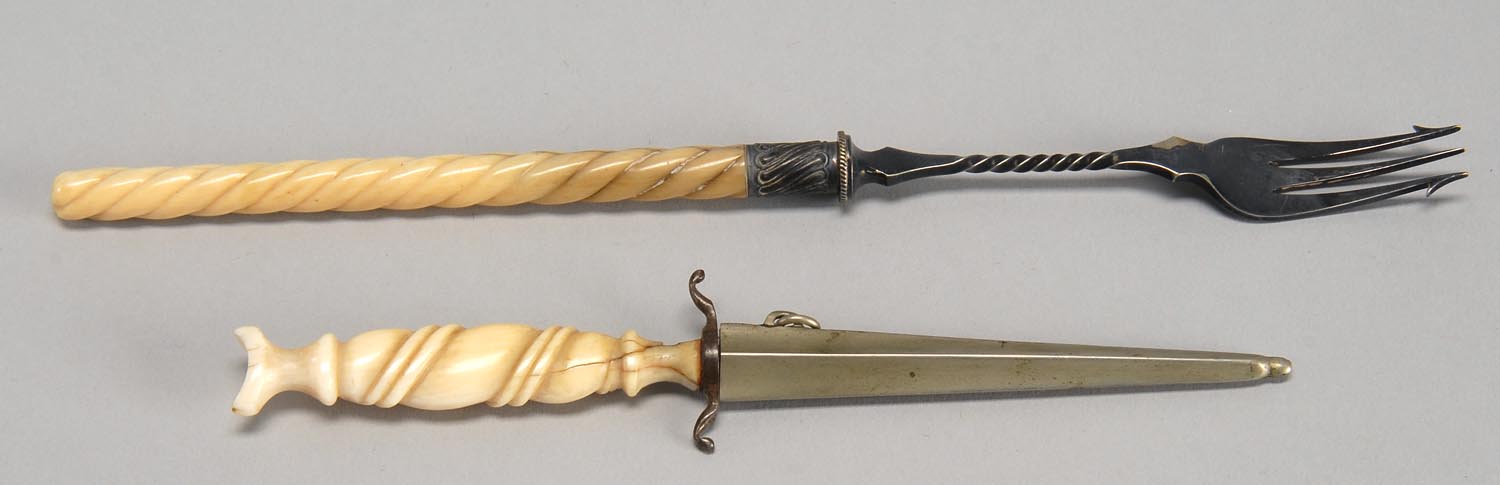 Appraisal: FORK AND MINIATURE DAGGER Continental th CenturyWith twist-carved elephant ivory