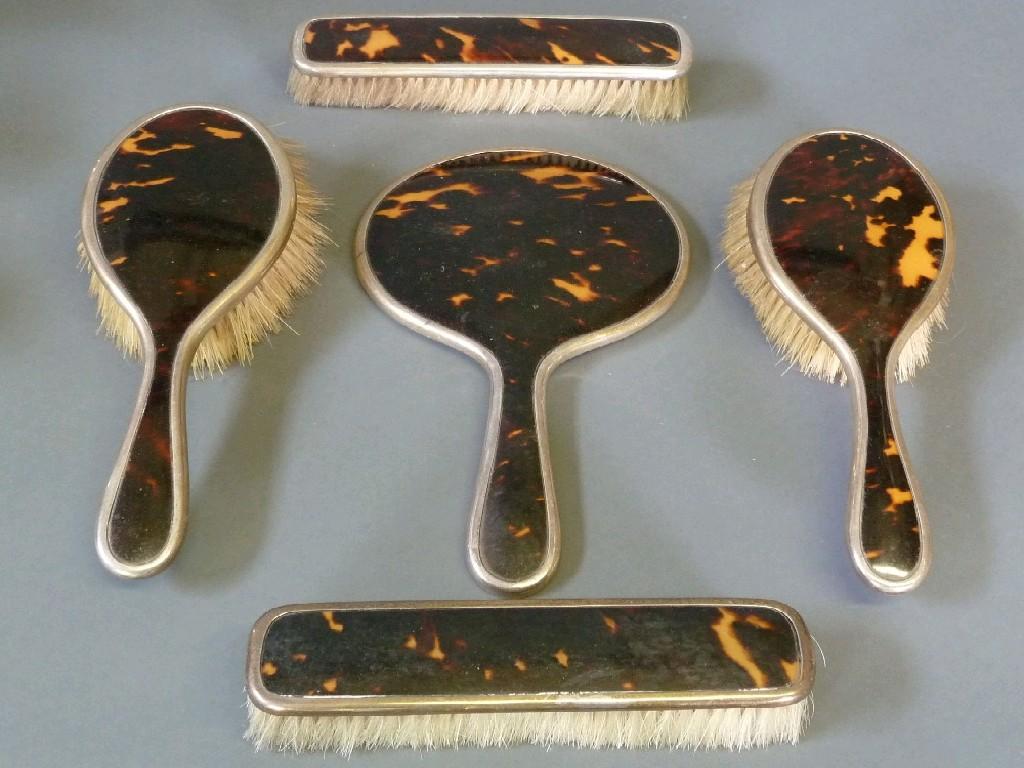 Appraisal: FIVE PIECE GEORGE V SILVER AND TORTOISESHELL DRESSING TABLE HAND