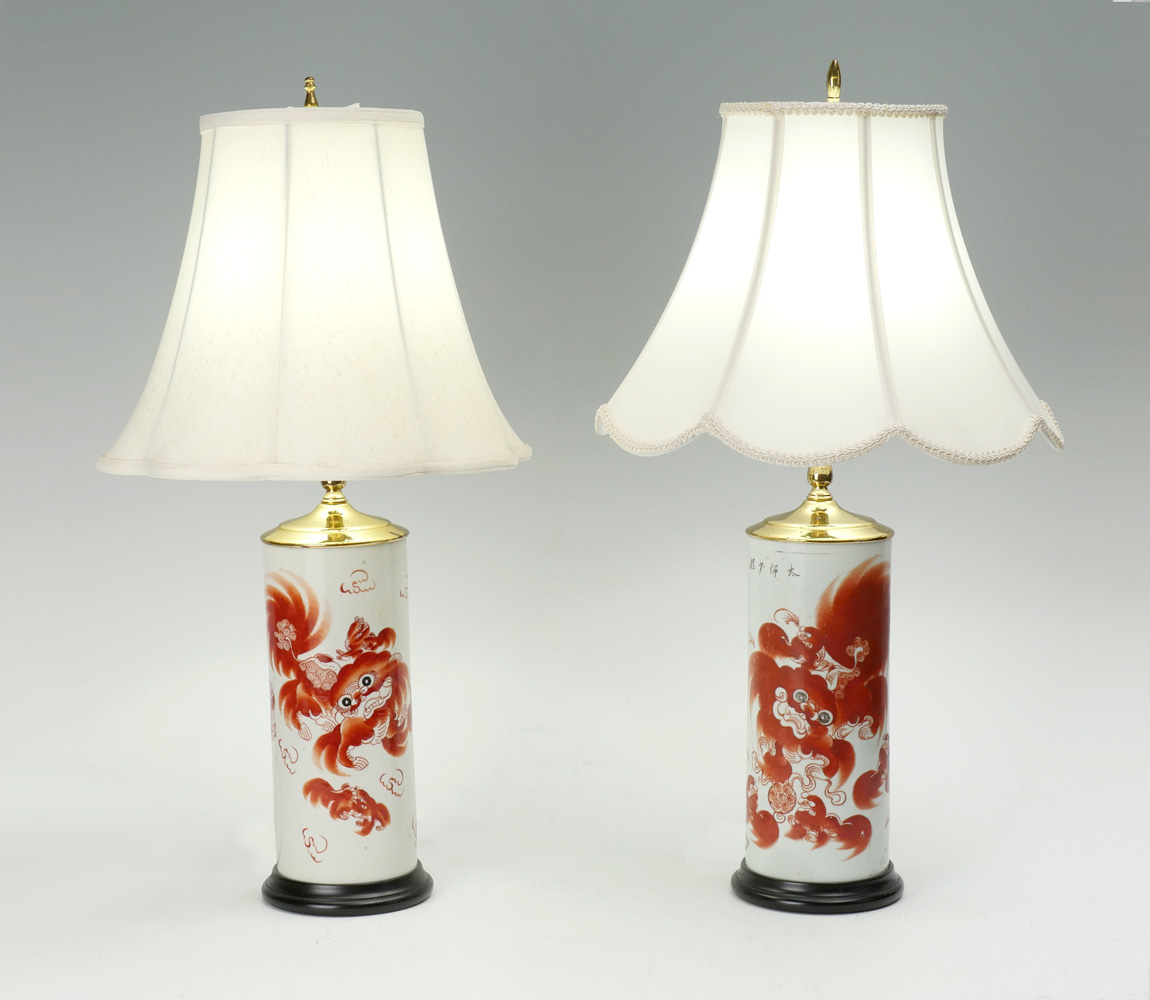 Appraisal: PAIR OF CHINESE OPPOSING FOO DOG LAMPS early th- late