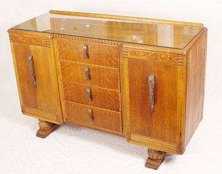 Appraisal: 'S ENGLISH CARVED OAK SIDEBOARD Four central drawers flanked by