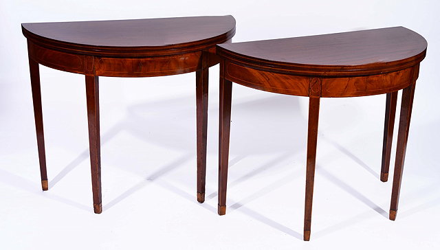 Appraisal: A PAIR OF GEORGE III MAHOGANY HALF ROUND CARD TABLES