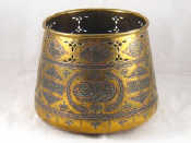 Appraisal: An Islamic brass cooking pot rim pierced and embossed with