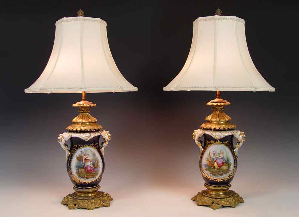 Appraisal: FINE PORCELAIN OLD PARIS LAMPS Hand painted reserves on cobalt