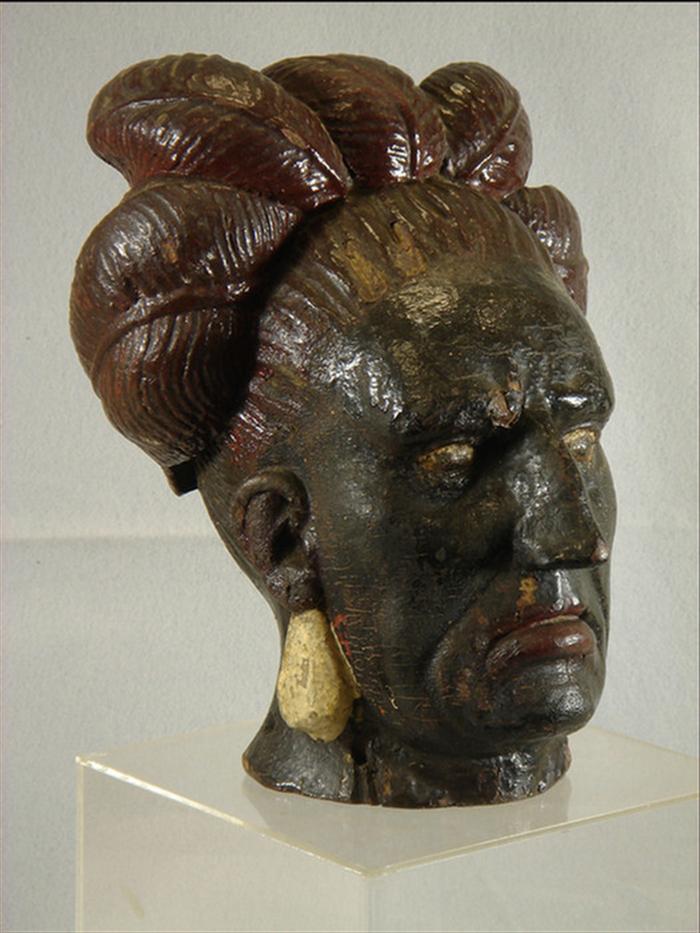 Appraisal: Carved and painted wood bust of a native man red