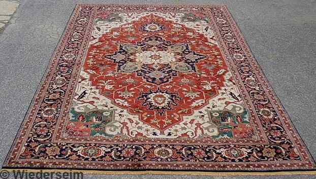 Appraisal: Palace size Heriz oriental carpet red field and overall floral