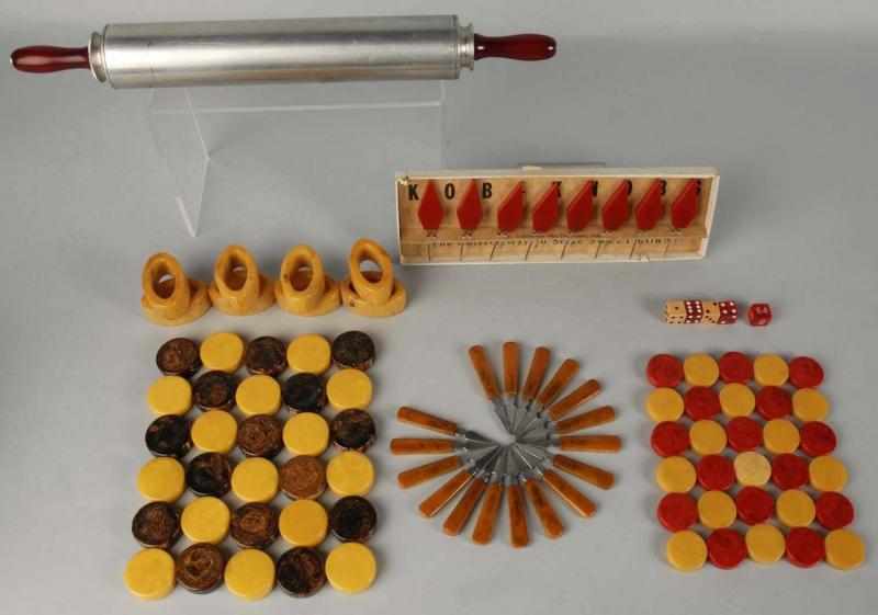 Appraisal: Large Lot of Bakelite Pieces Description Includes one handled rolling