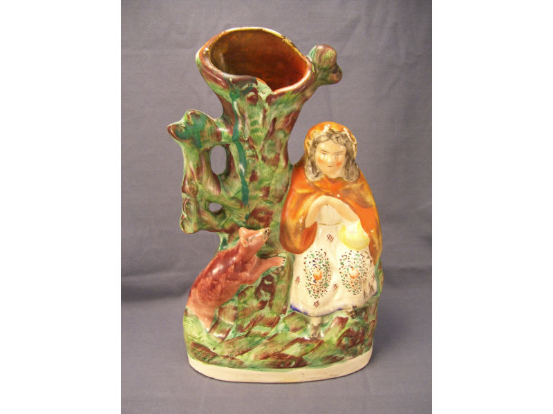 Appraisal: Staffordshire Red Riding Hood Spill Vase Good color and condition