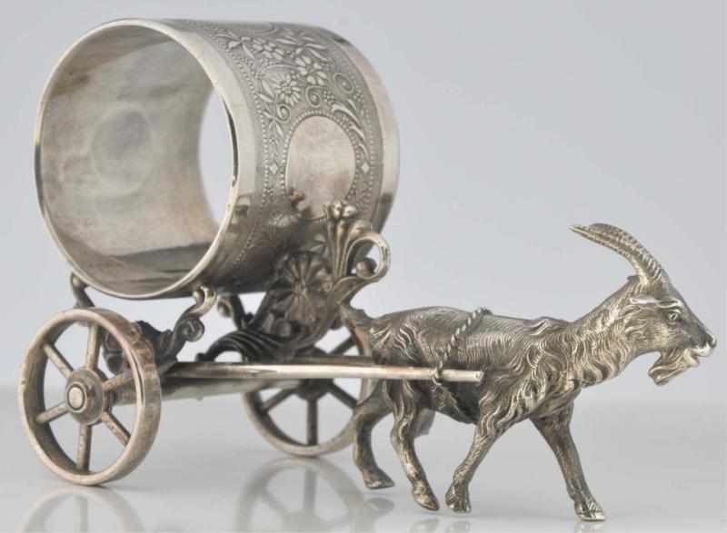 Appraisal: Goat Pulls Holder on Wheels Figural Napkin Ring By Meriden