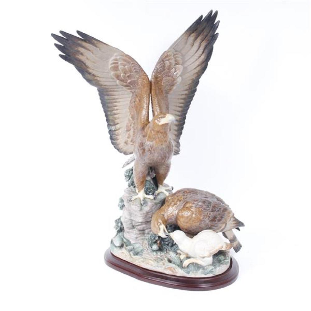 Appraisal: MONUMENTAL LLADRO PORCELAIN EAGLE ON WOOD STAND SCULPTED BY ANTONIO