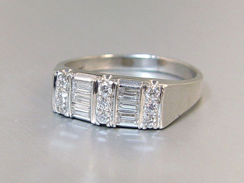 Appraisal: PLATINUM AND DIAMOND RING SIZE Platinum diamond ring contains rows