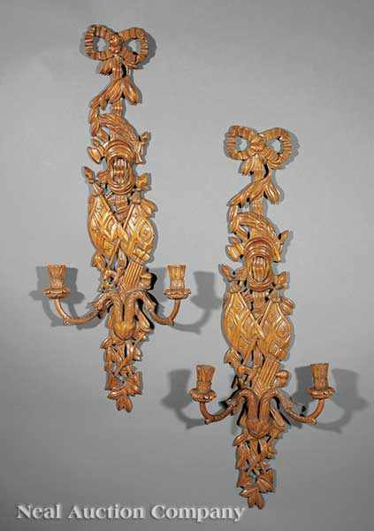 Appraisal: A Pair of Italian Carved Walnut Sconces th c the