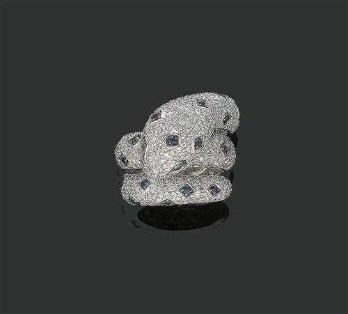 Appraisal: BRILLIANT-CUT DIAMOND AND GEMSTONE RING White gold Very attractive large