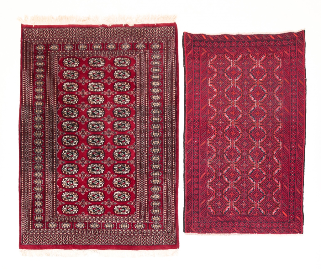 Appraisal: th century Both are hand knotted wool A Bokhara with