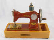 Appraisal: A Soviet Russian child's sewing machine in original hard fibre