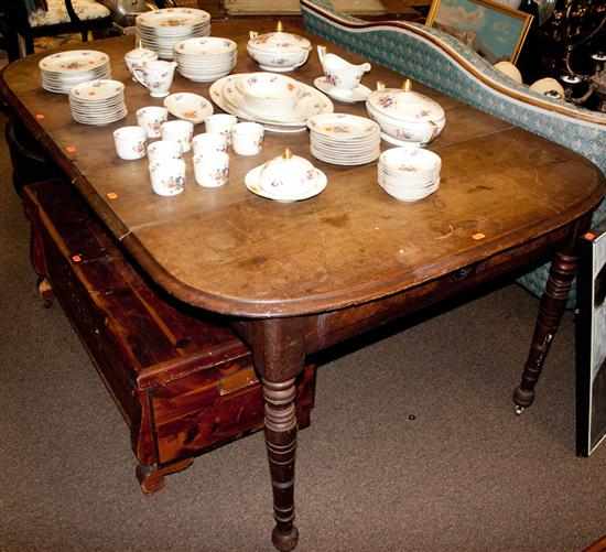 Appraisal: Victorian walnut extension table with three leaves Estimate - No