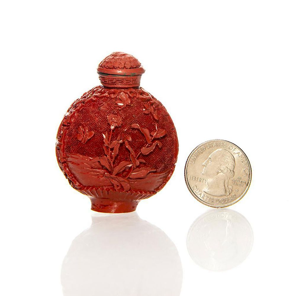 Appraisal: RARE HAND CARVED CINNABAR ORIENTAL SNUFF BOTTLE Rich crimson red