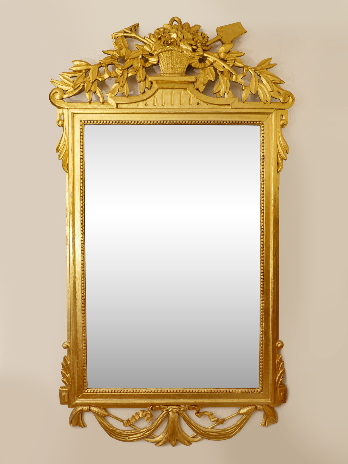 Appraisal: LOUIS XVI STYLE CARVED AND GILT MIRROR Louis XVI style