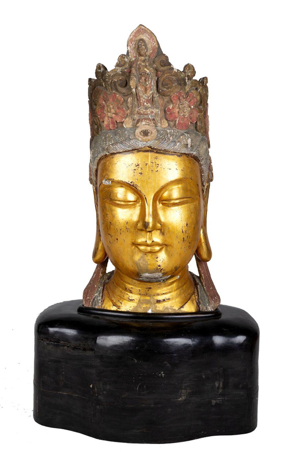 Appraisal: BURMESE POLYCHROME CARVED BUST OF BUDDHAresting on wood base inches