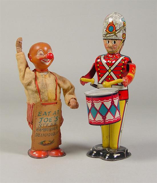 Appraisal: Two Tin Wind-Up Toys George the Drummer Boy Soldier high