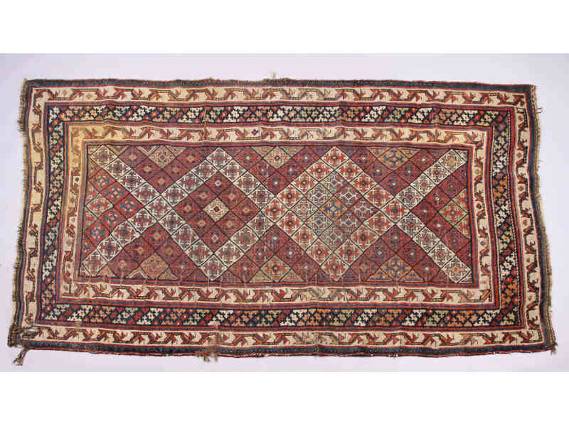 Appraisal: Kurd-Kazak Rug ca - central panel all over geometrical diamond