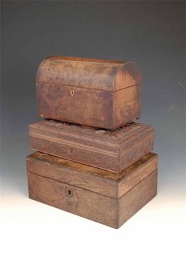 Appraisal: A Victorian walnut stationery box with a domed lid in