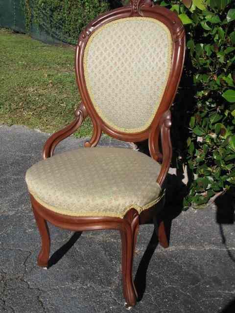 Appraisal: Antique Victorian carved mahogany upholstered chair Green floral upholstery with