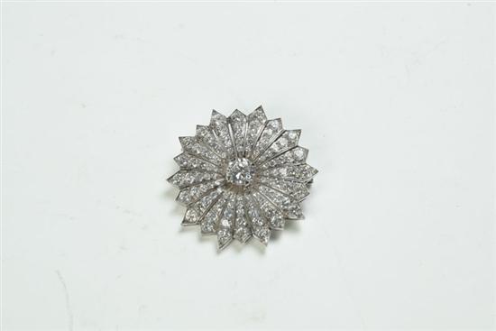 Appraisal: DIAMOND BROOCH Twentieth century unmarked platinum with a center diamond