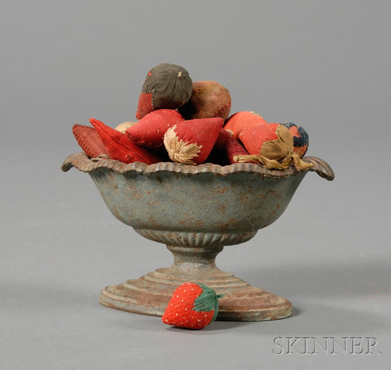 Appraisal: Small Blue-painted Cast Iron Urn Filled with Strawberry-form Pincushions and