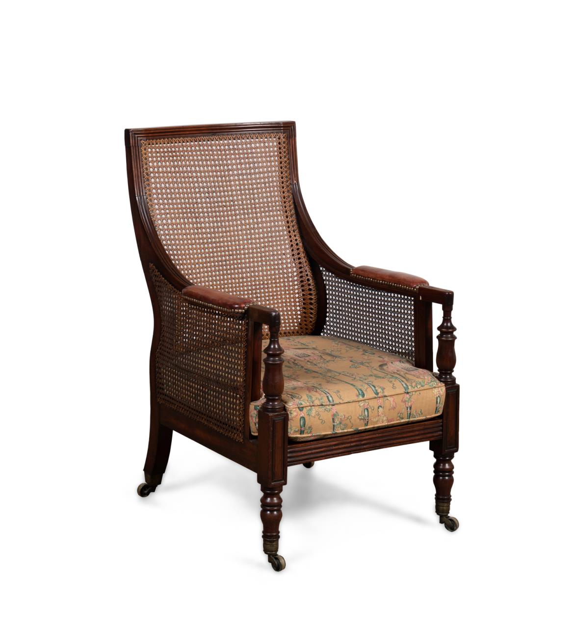 Appraisal: EDWARDIAN CANED MAHOGANY LIBRARY CHAIR English early th century mahogany