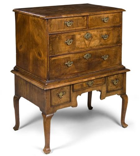 Appraisal: A Queen Anne walnut and feather banded chest on stand