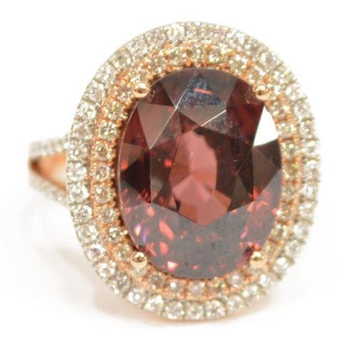 Appraisal: Ladies kt rose gold diamond and red zircon ring prong