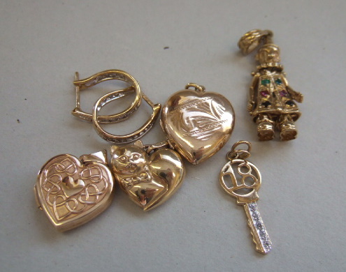 Appraisal: A ct gold and gem set pendant designed as an