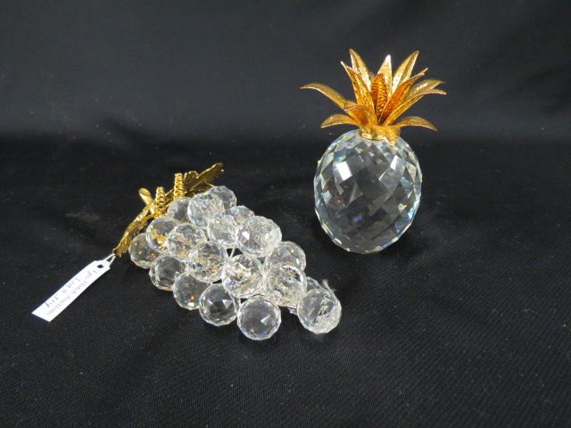 Appraisal: Swarovski Crystal Figurines of Pineappleand grape cluster each with gold