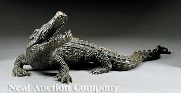 Appraisal: A Patinated Bronze of an Alligator th c the figure