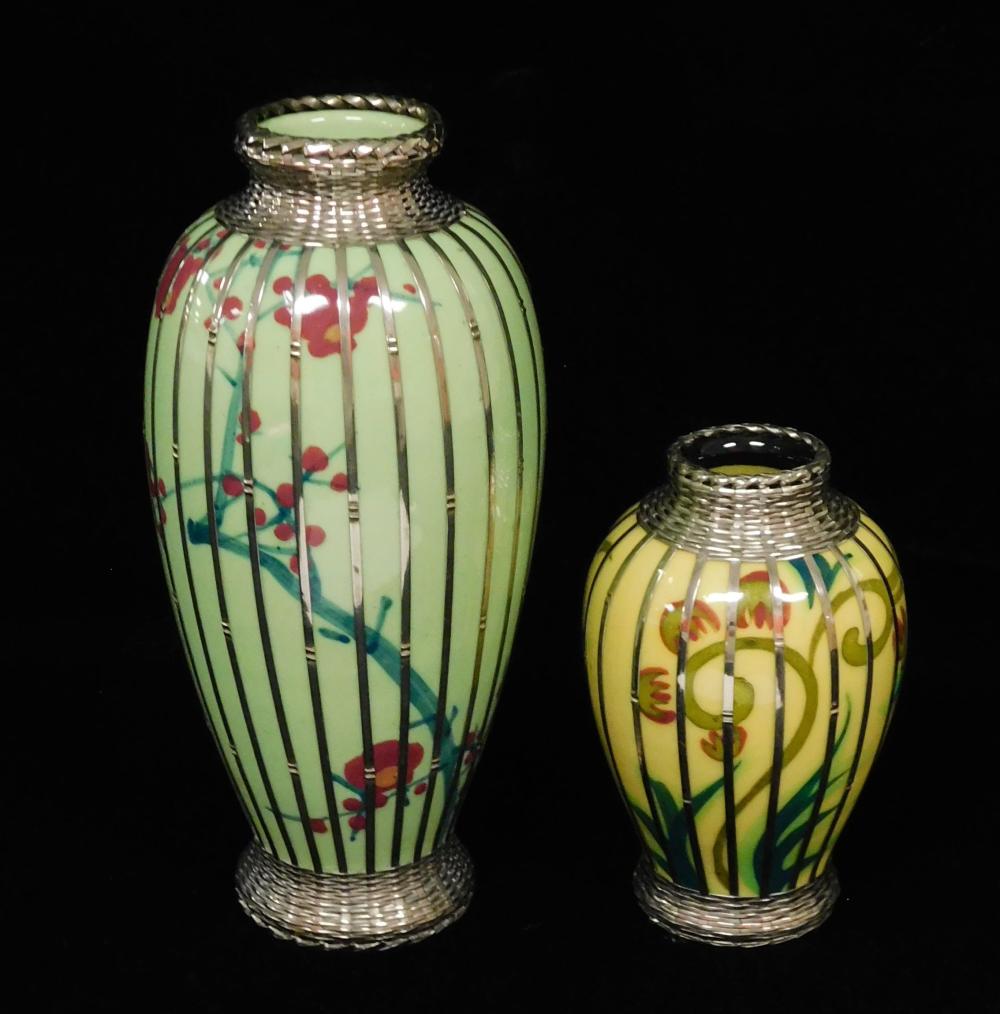 Appraisal: ASIAN TWO JAPANESE PORCELAIN VASES WITH SILVER OVERLAY ONE LIGHT